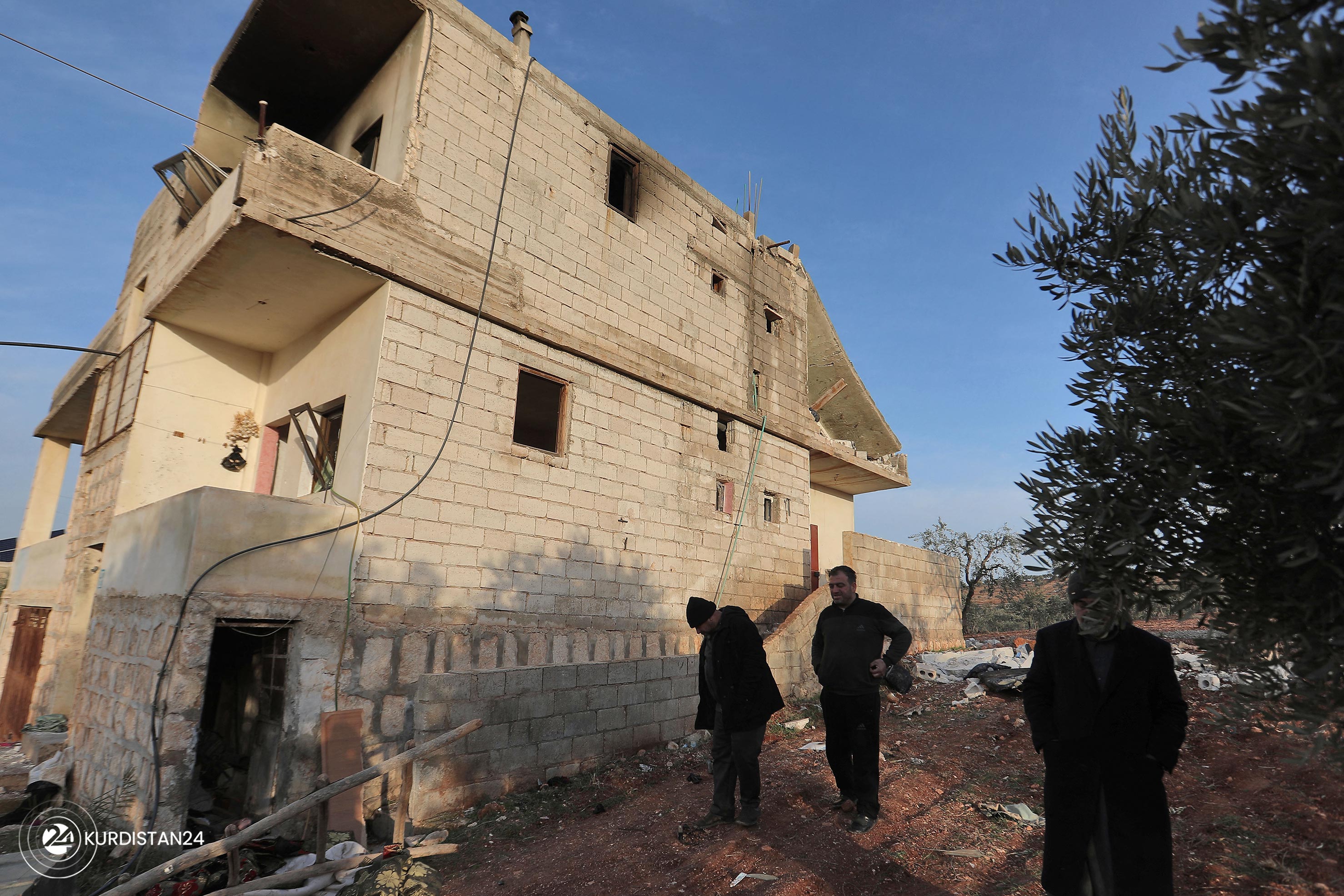 Syrians gather following an overnight raid by US special operations force, Feb. 3, 2022. (Photo: Aaref Watad/AFP)